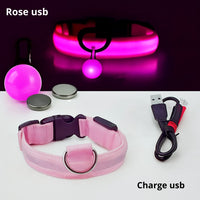 Happy Animalia pink LED dog collar with USB charging and luminous pendant for night walks. Rechargeable and waterproof.