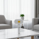 Happy Animalia white 3-in-1 steam pet grooming brush with yellow button and USB charging