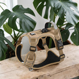Happy Animalia tan nylon dog harness with integrated AirTag holder and reflective strips for visibility.