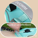 Happy Animalia teal dog harness with integrated AirTag holder and reflective trim. Adjustable straps for secure fit.