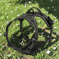 Happy Animalia black anti-traction dog harness with reflective trim and padded straps for comfort and control.